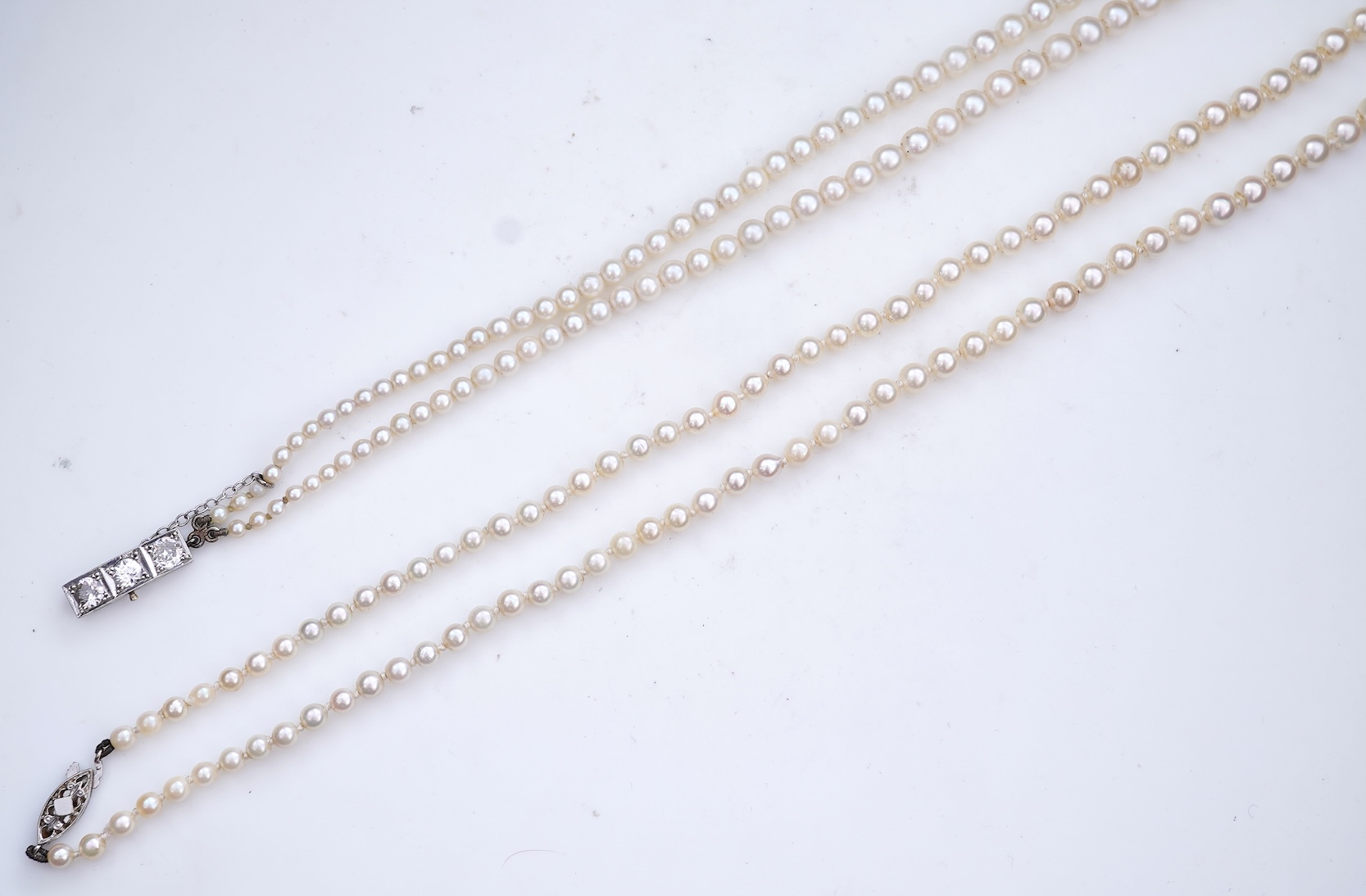 A cultured pearl and diamond necklace, early 20th century